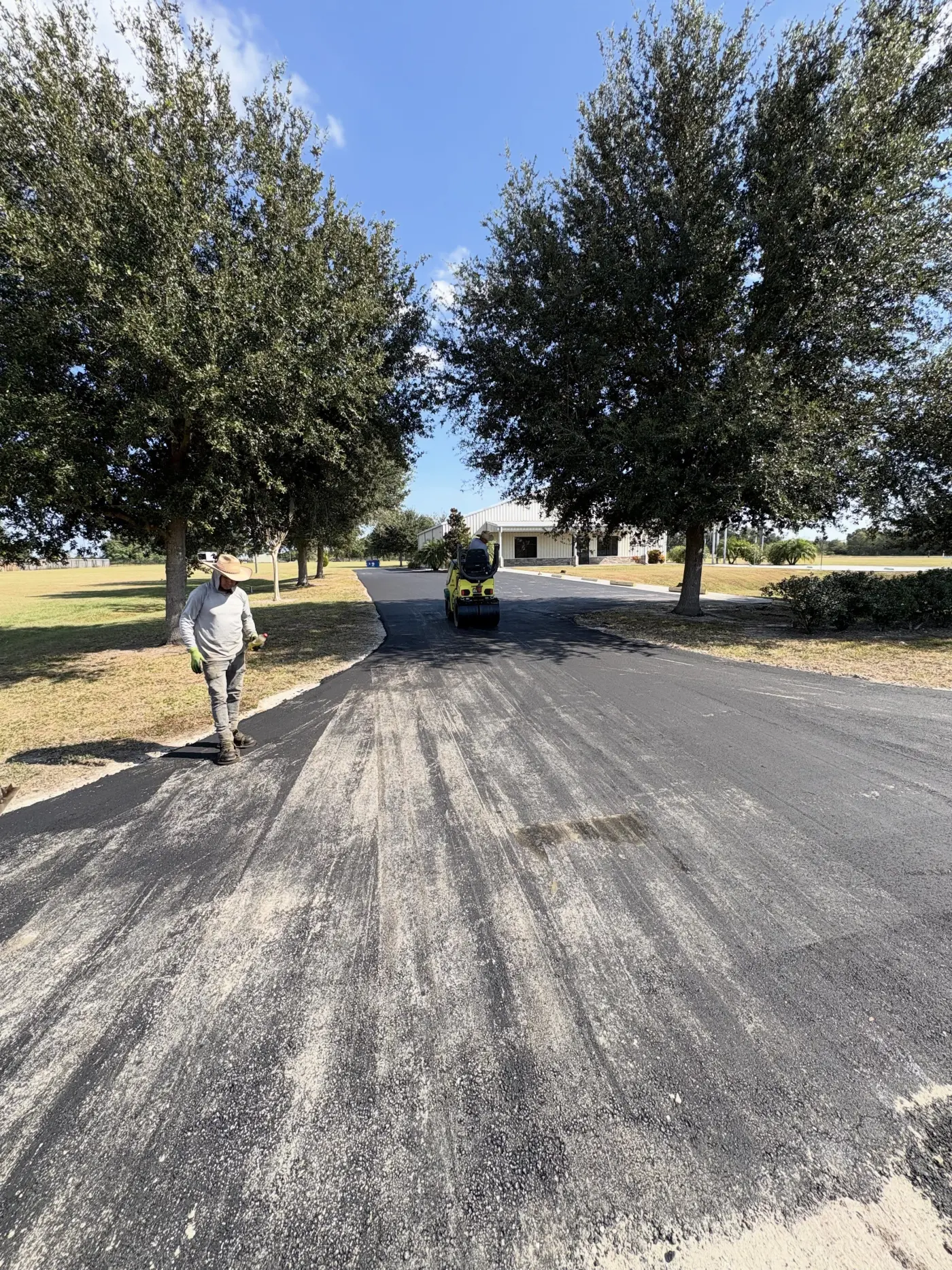 A long, finished residential driveway